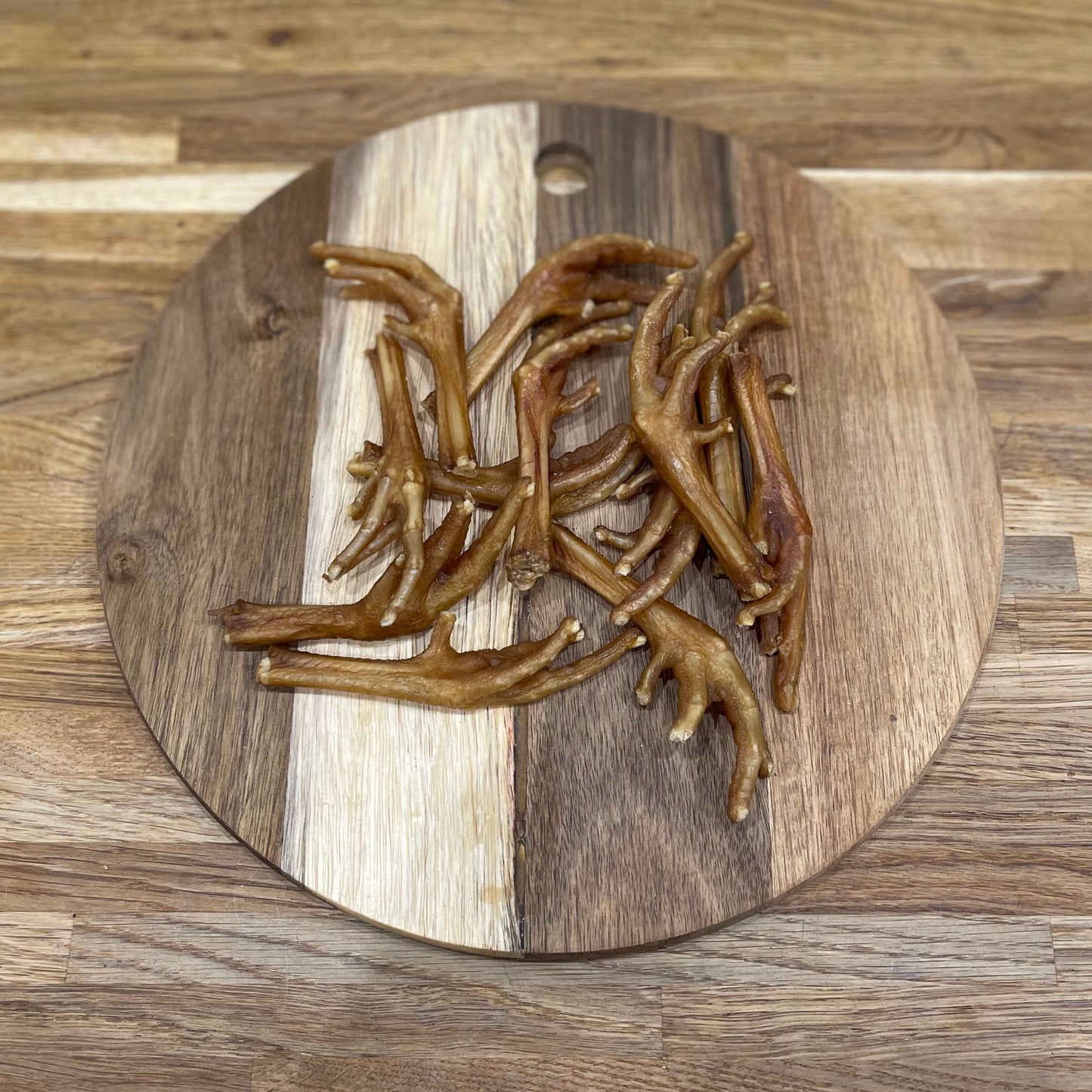 100% natural air dried chicken feet, these crunchy snacks are really healthy, great for keeping teeth clean and can be used as a treat or reward for training 100% natural High in protein High in glucosamine and chondroitin No preservatives or additives Grain and gluten free Air dried to lock in flavour Raw feeding friendly