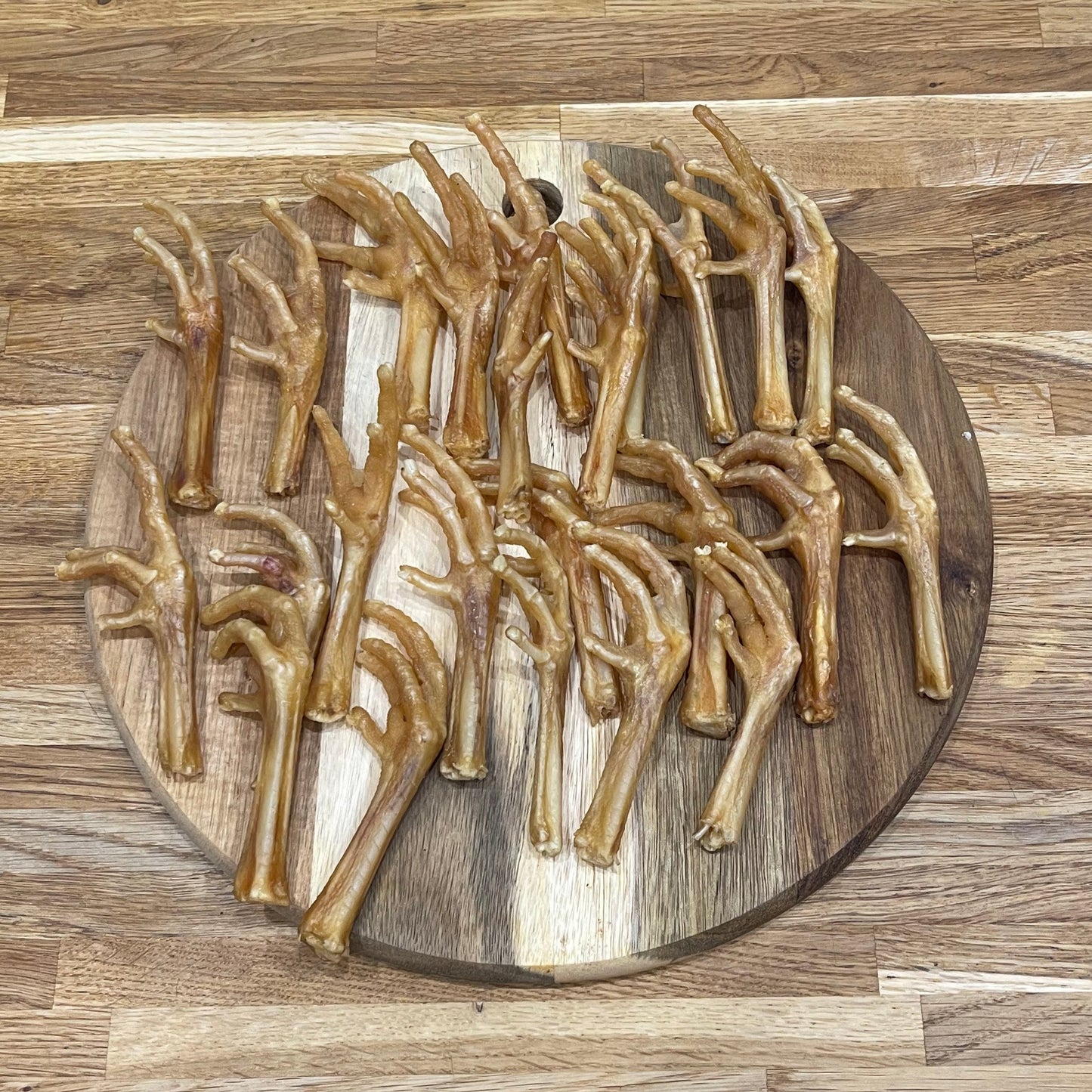 100% natural air dried chicken feet, these crunchy snacks are really healthy, great for keeping teeth clean and can be used as a treat or reward for training 100% natural High in protein High in glucosamine and chondroitin No preservatives or additives Grain and gluten free Air dried to lock in flavour Raw feeding friendly